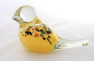 light yellow glass bird